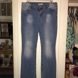 Woman’s (juniors) size 11 sand washed jeans.